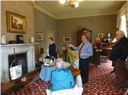 Friends admiring the restoration of the Elizabeth Gaskell house.